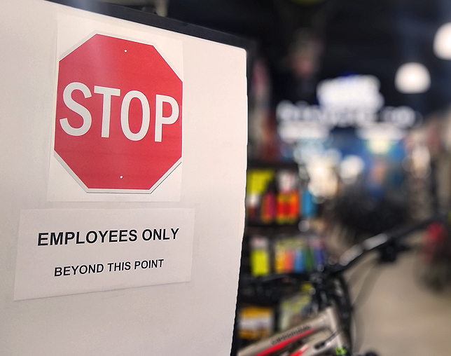 Higher Ground bike shop takes social distancing precautions.